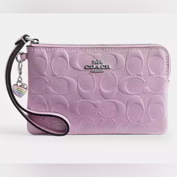 Coach Handbags - Coach Lavender Embossed Wristlet